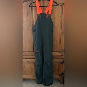 Helly Hansen Kids One Piece in Dark Green and Orange